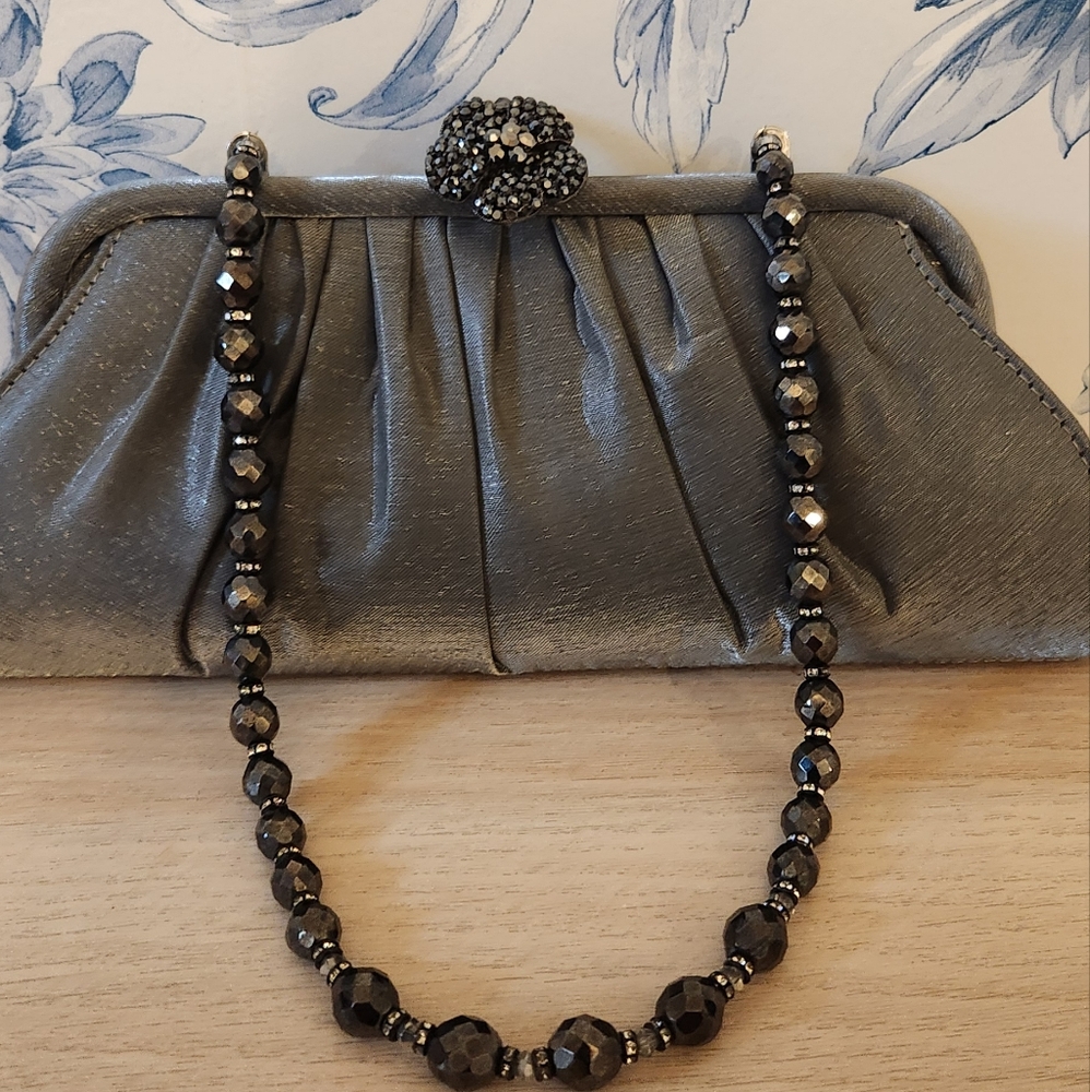 Grey Clutch with Bejeweled Clasp and Decorative Strap